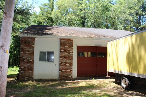 62 Adams Road Townsend, MA 01469 - Photo 11 of 16 a front view of house with yard