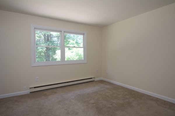62 Adams Road Townsend, MA 01469 - Photo 6 of 16 an empty room with a window