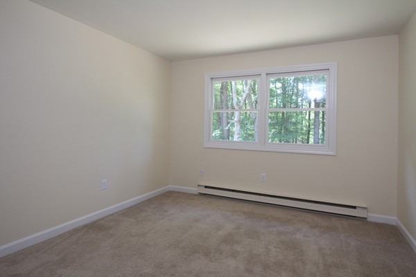 62 Adams Road Townsend, MA 01469 - Photo 8 of 16 an empty room with a window