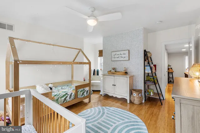 a view of a livingroom with furniture and windows
