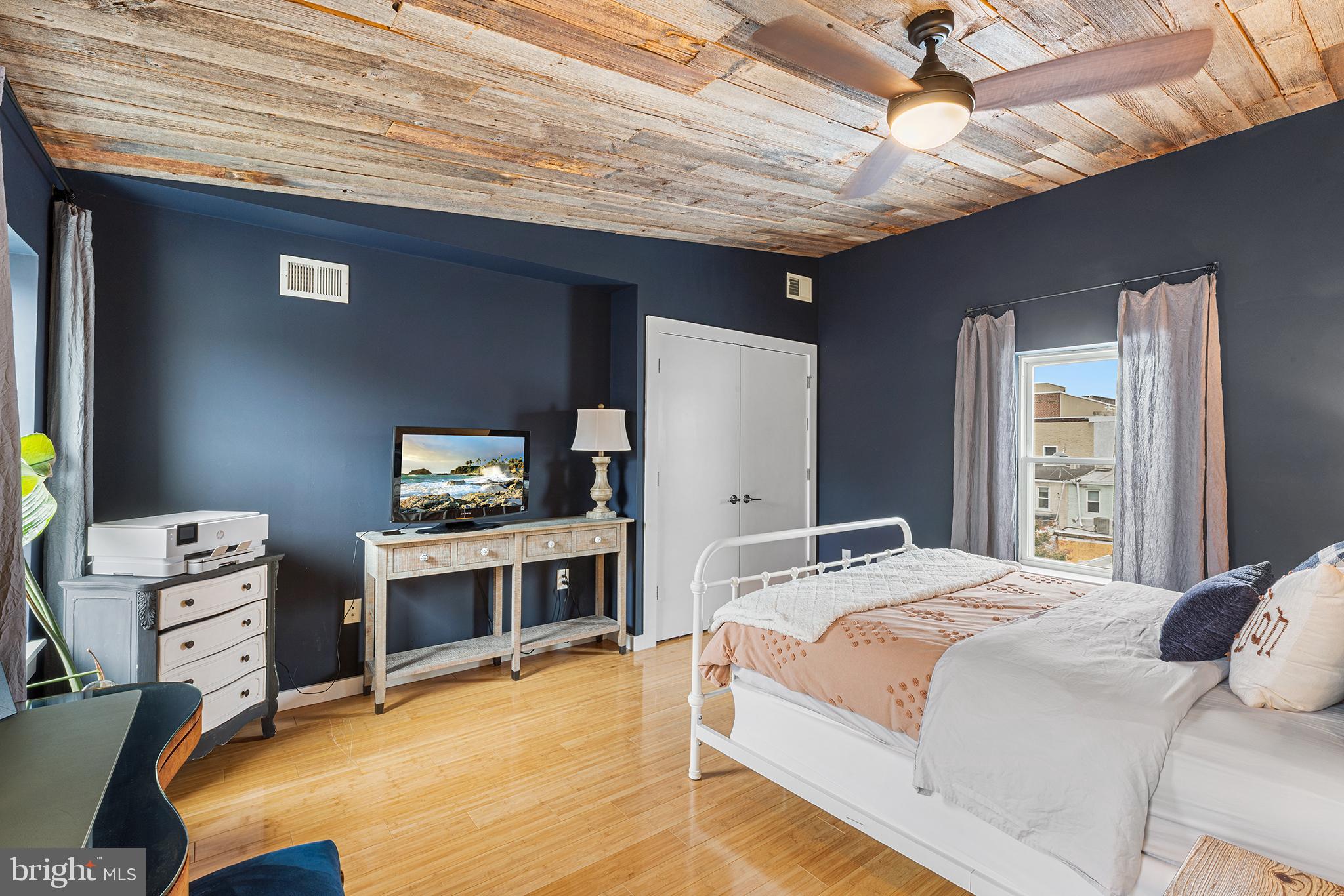 1337 Marlborough Street Philadelphia, PA 19125 - Photo 25 of 34 a bedroom with a bed and a desk