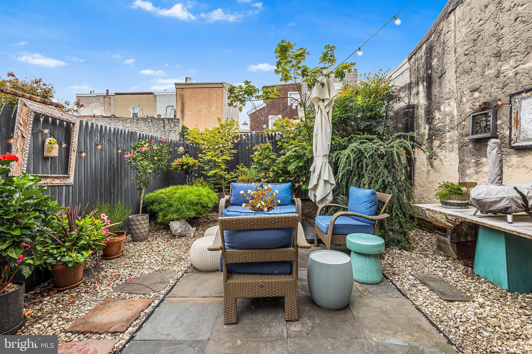 1337 Marlborough Street Philadelphia, PA 19125 - Photo 32 of 34 a view of a patio with couches and potted plants
