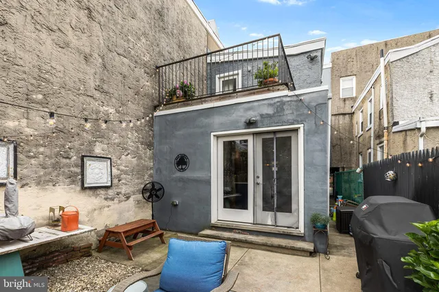 a house view with a outdoor space