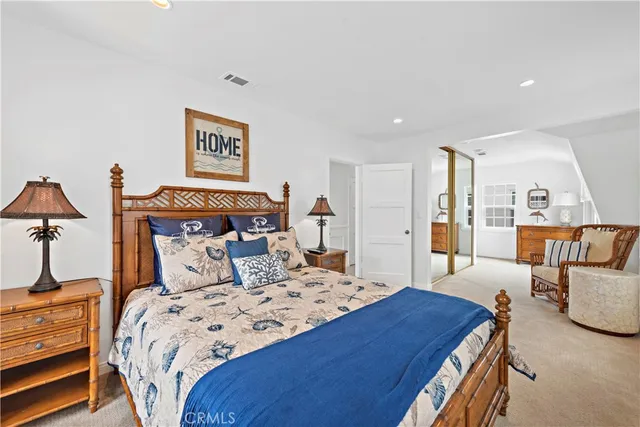 a bedroom with a bed and furniture