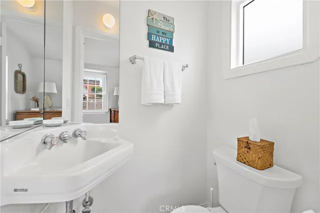 a bathroom with a sink and a toilet