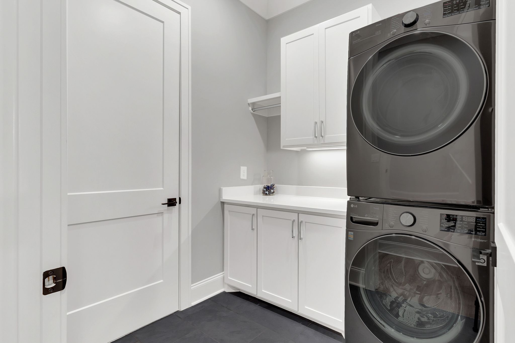 6313 Percheron Lane Arrington, TN 37014 - Photo 54 of 87 a utility room with sink dryer and washer