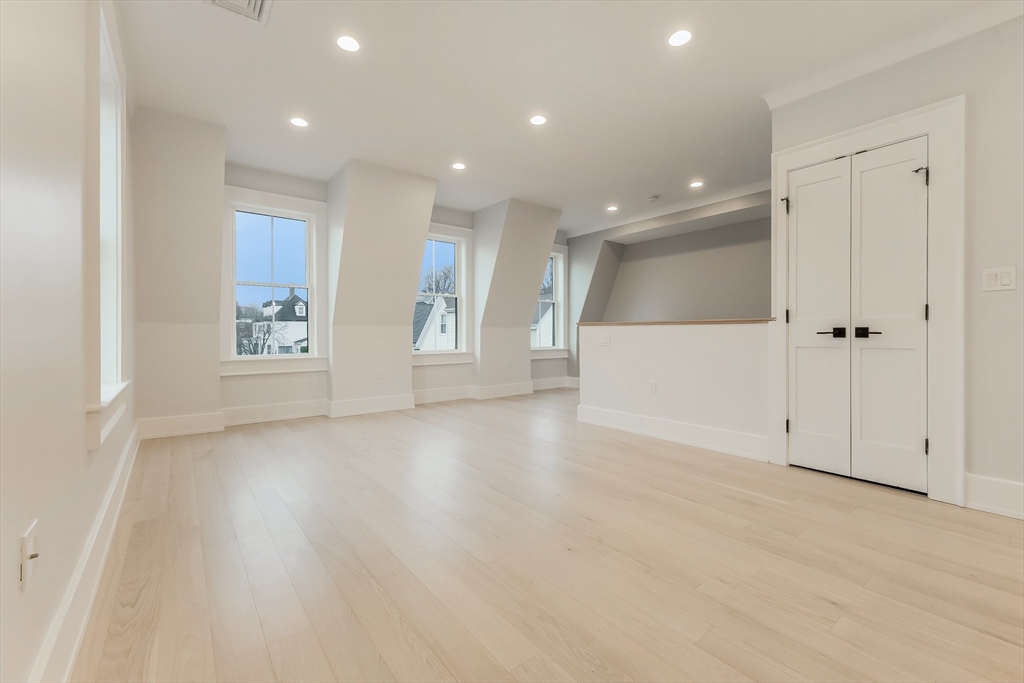 15 McKone Street, Unit 2 Boston, MA 02122 - Photo 8 of 24 a view of an empty room with a window