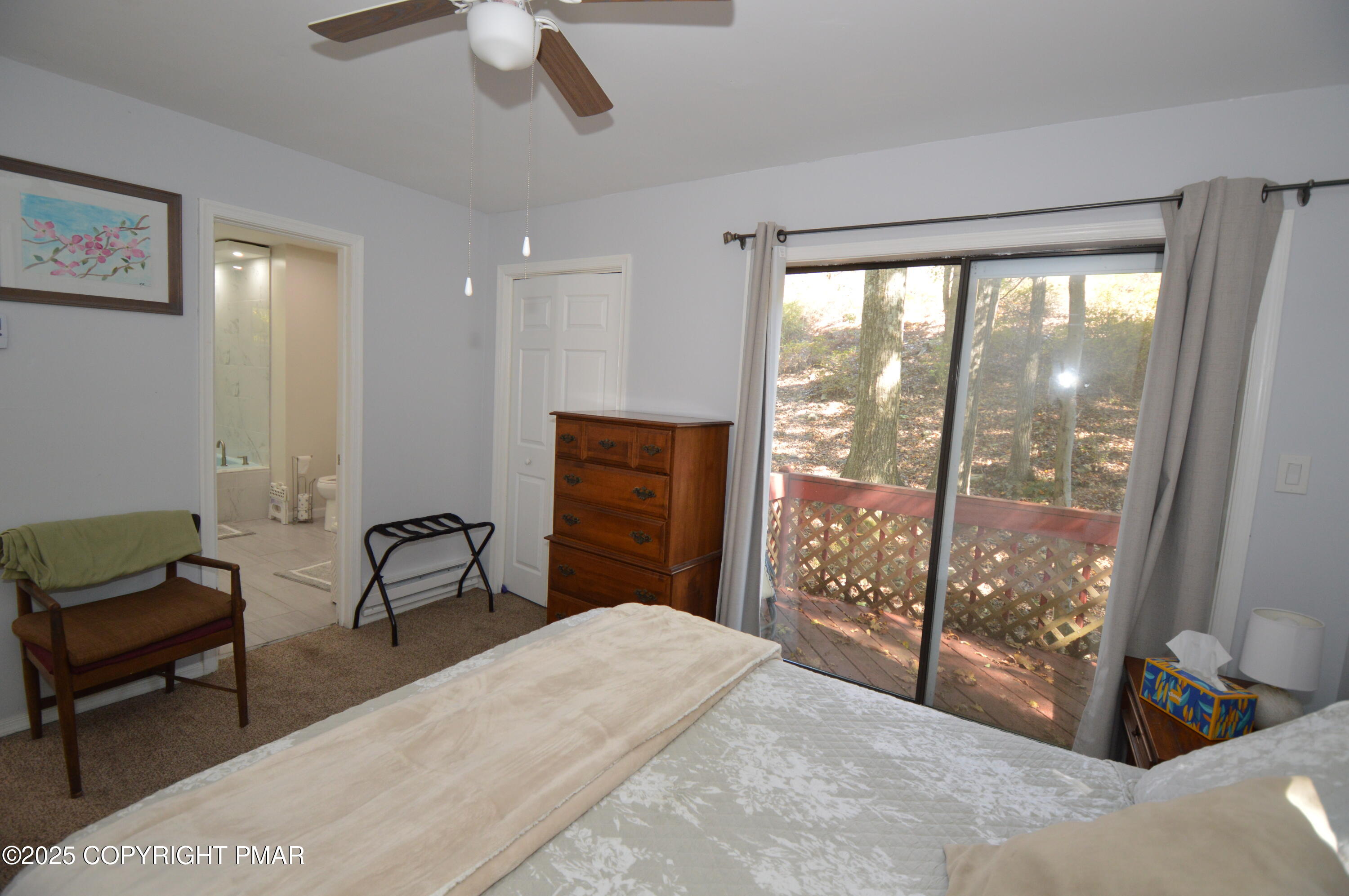 128 Ashley Court Bushkill, PA 18324 - Photo 27 of 43 a bedroom with furniture and a large window