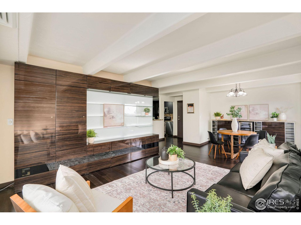 a living room with furniture and a table