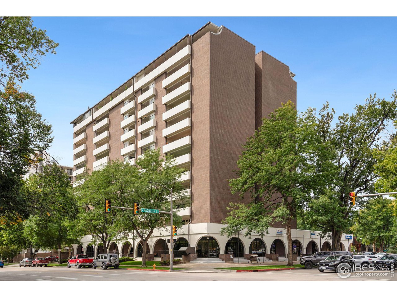 415 South Howes Street, Unit 910 Fort Collins, CO 80521 - Photo 2 of 28 a view of street with parking