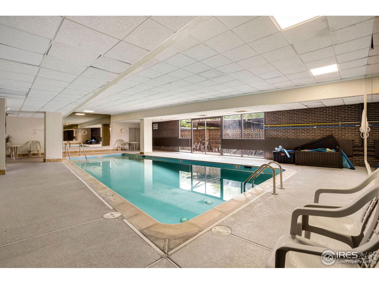 415 South Howes Street, Unit 910 Fort Collins, CO 80521 - Photo 24 of 28 a living room with furniture