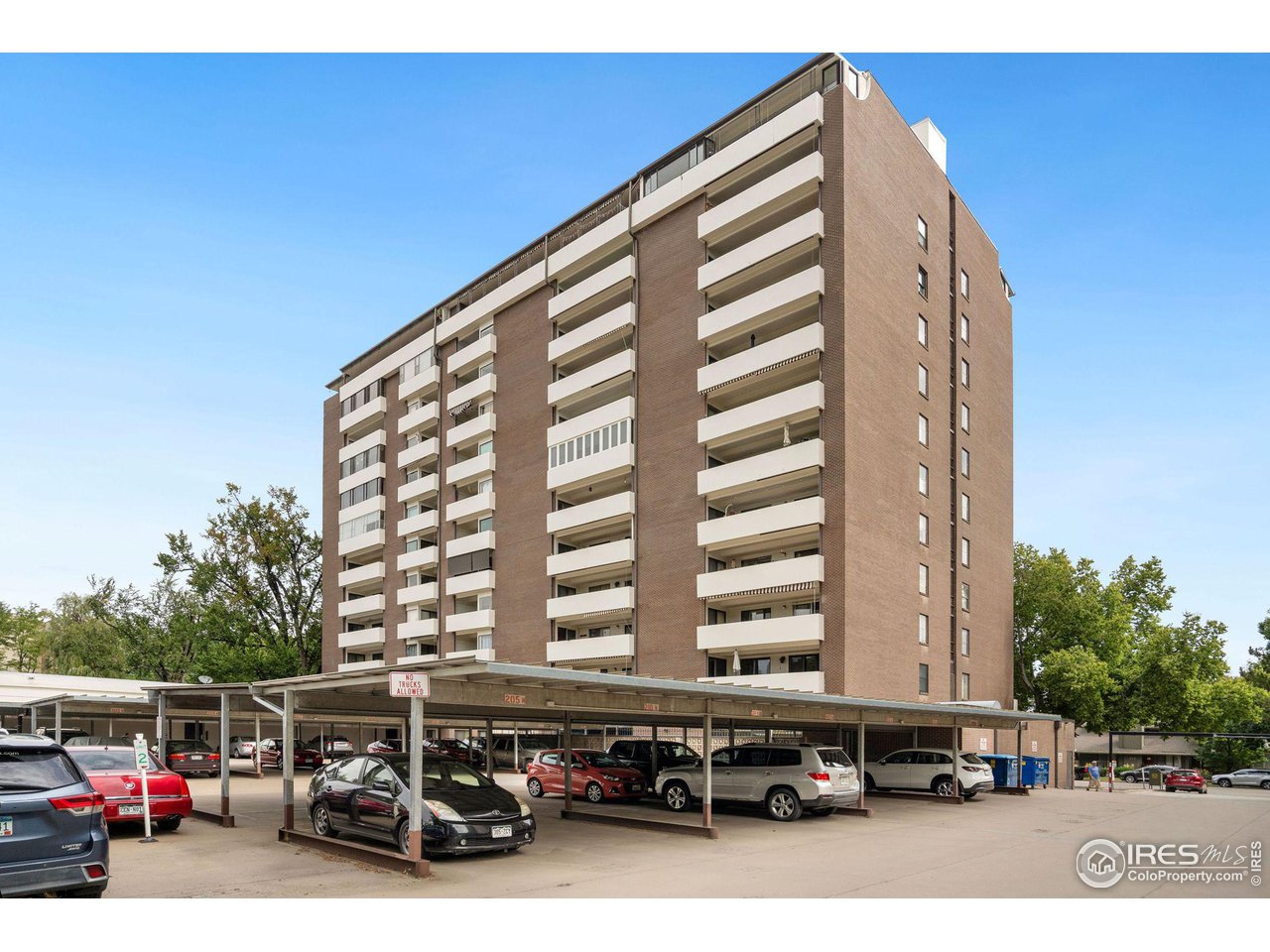 415 South Howes Street, Unit 910 Fort Collins, CO 80521 - Photo 28 of 28 a view of a building with cars parked