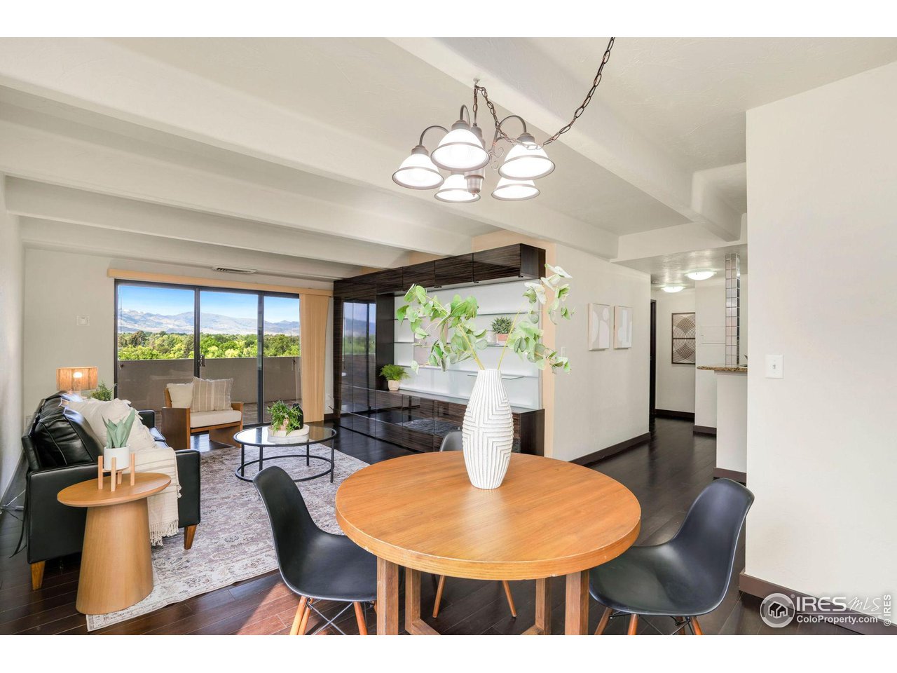 415 South Howes Street, Unit 910 Fort Collins, CO 80521 - Photo 6 of 28 a view of a dining room with furniture window and outside view