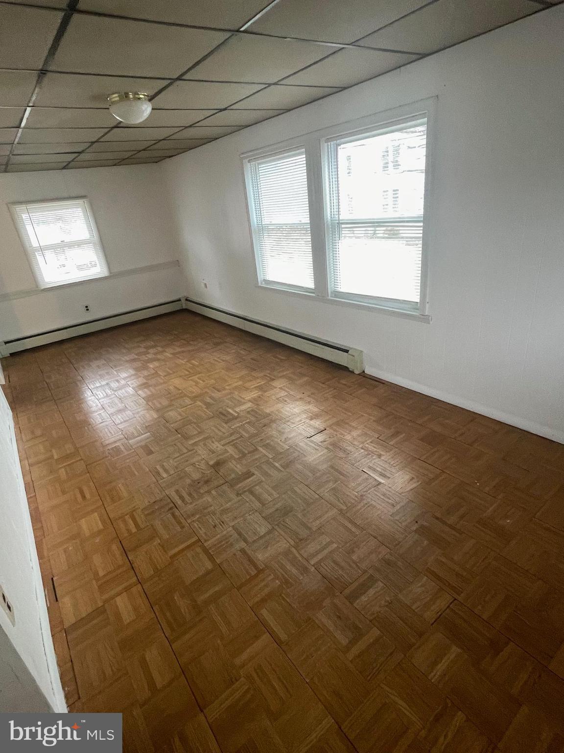 425 Rear Seventh Street New Cumberland, PA 17070 - Photo 21 of 23 an empty room with windows