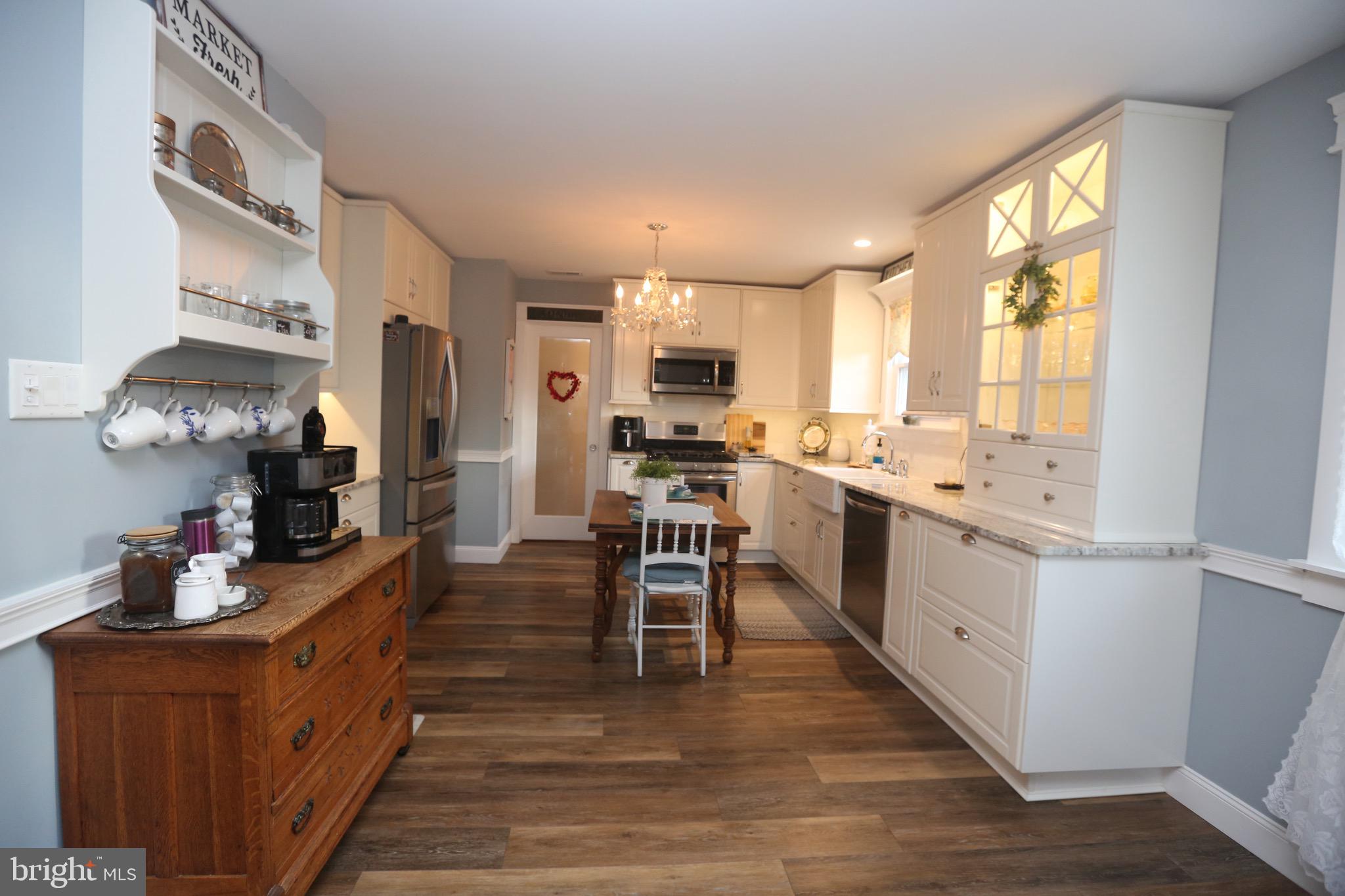 33 Pembrook Road Turnersville, NJ 08012 - Photo 13 of 43 a large kitchen with a table and chairs