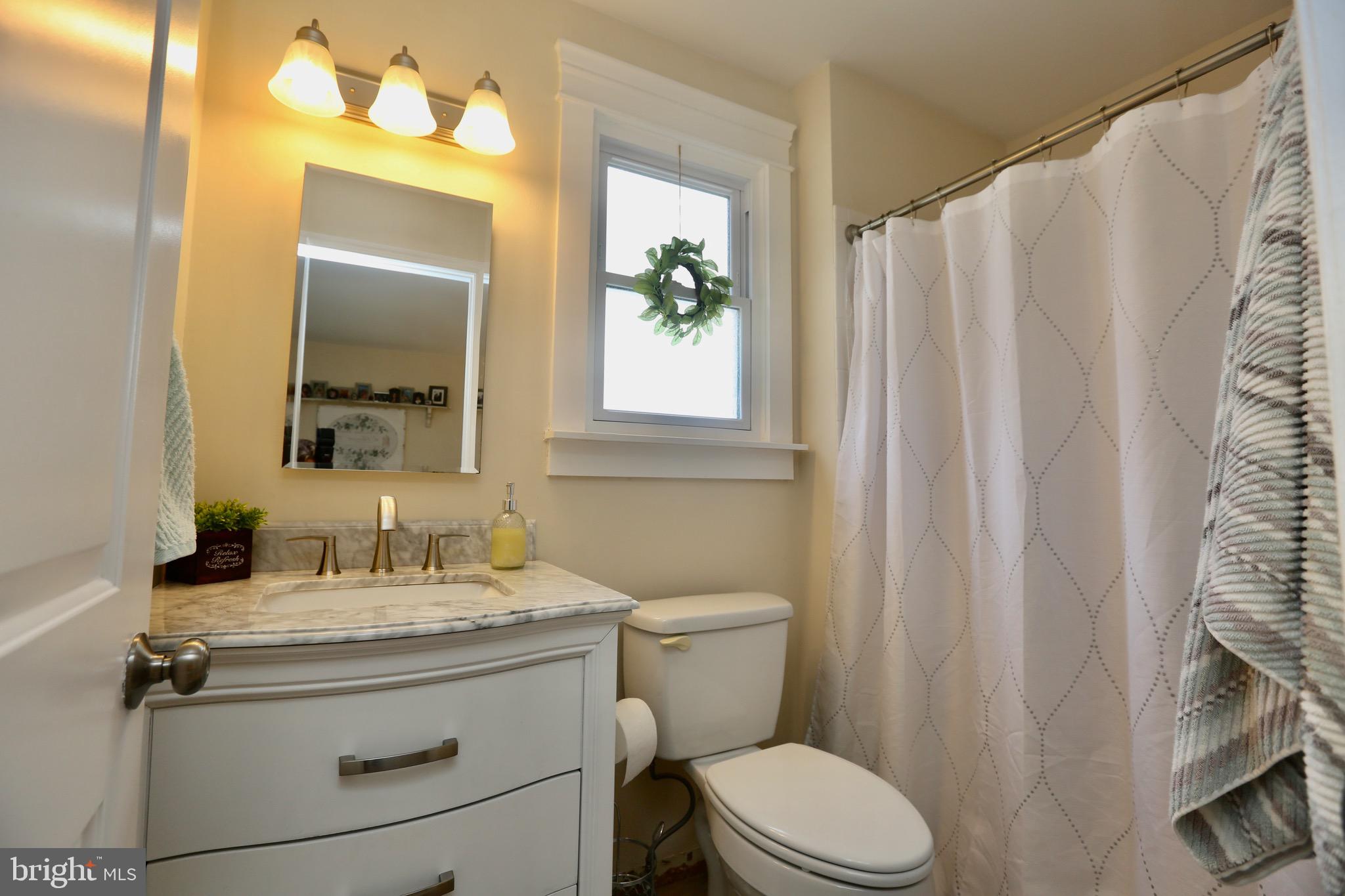 33 Pembrook Road Turnersville, NJ 08012 - Photo 19 of 43 a bathroom with a granite countertop sink toilet and mirror