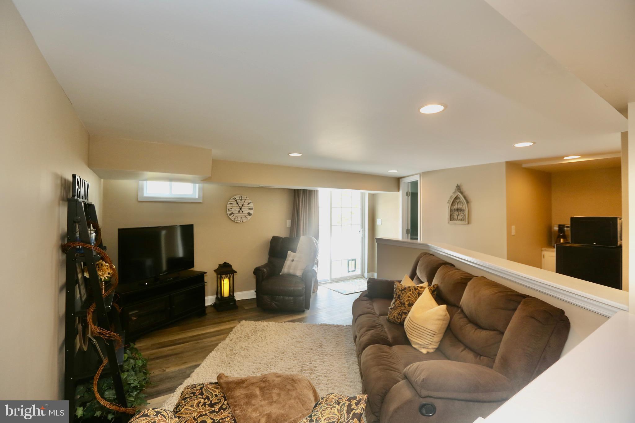 33 Pembrook Road Turnersville, NJ 08012 - Photo 30 of 43 a living room with furniture and a flat screen tv