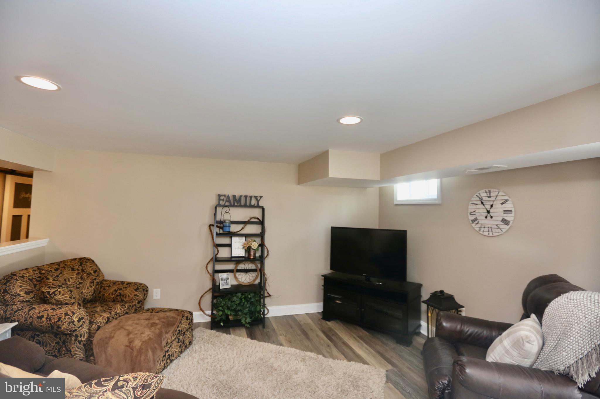 33 Pembrook Road Turnersville, NJ 08012 - Photo 31 of 43 a living room with furniture and a flat screen tv