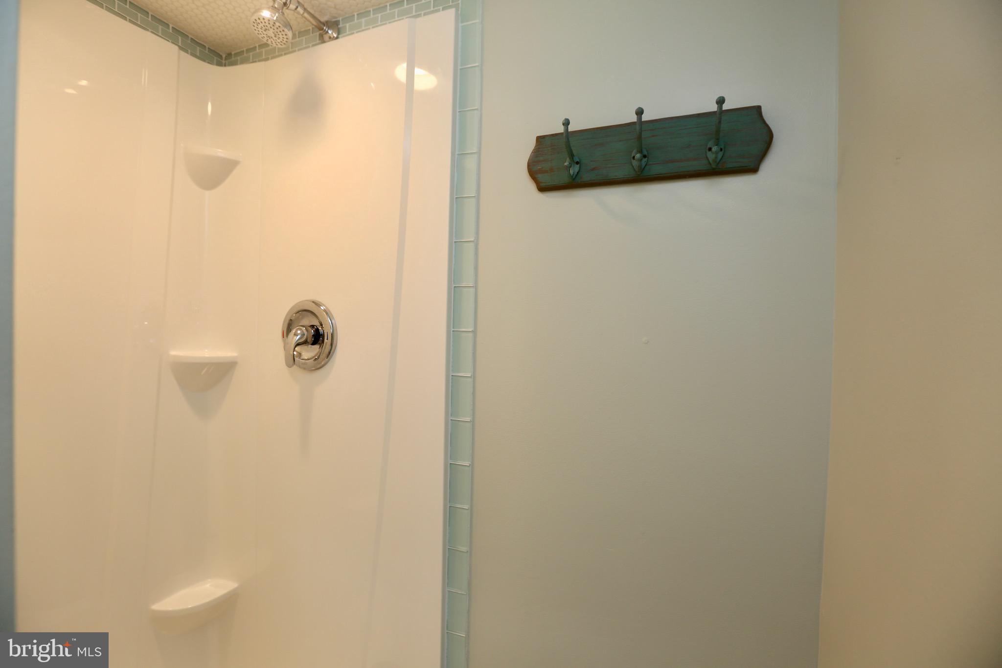 33 Pembrook Road Turnersville, NJ 08012 - Photo 36 of 43 a bathroom with a shower and a mirror