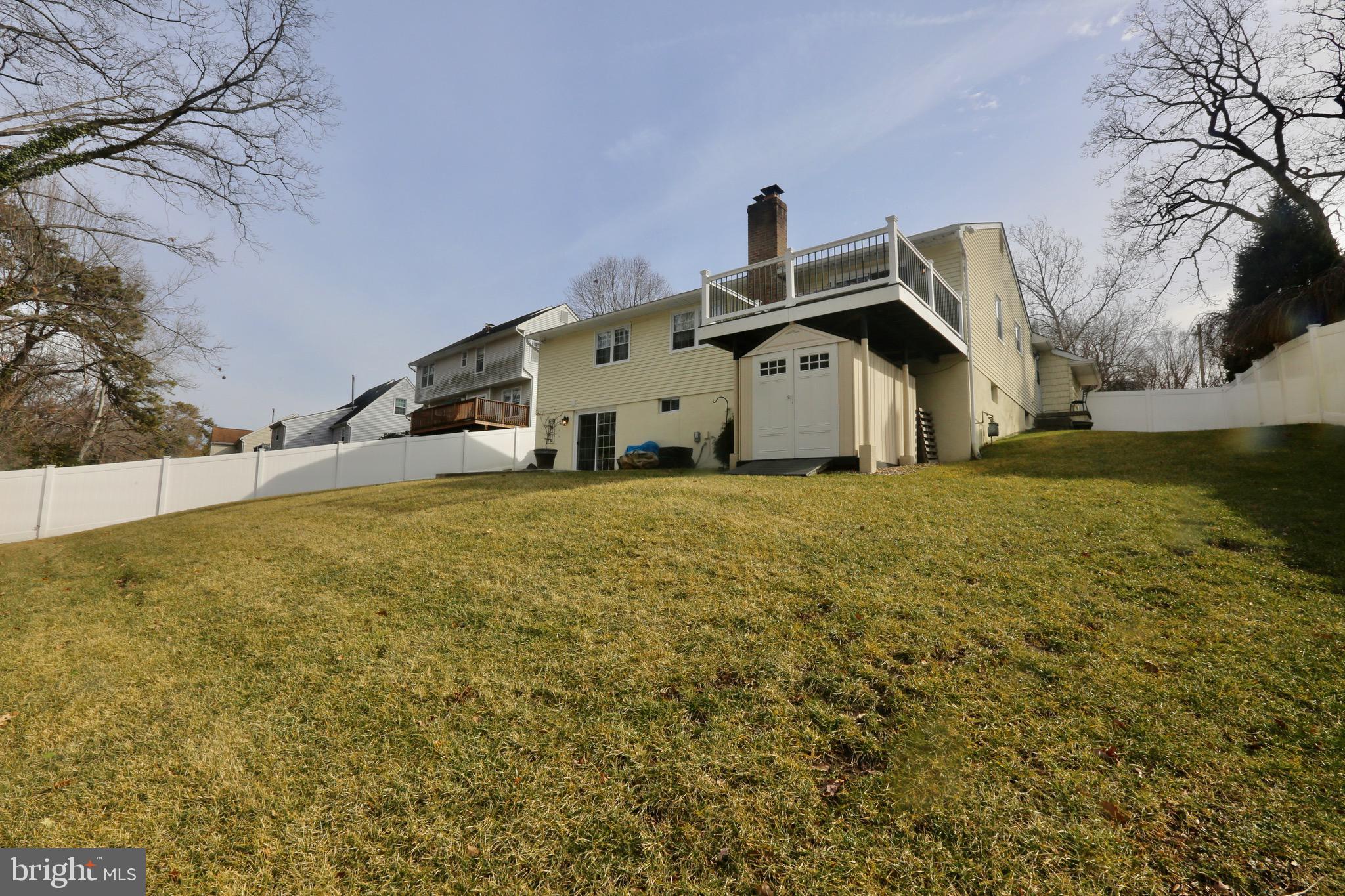 33 Pembrook Road Turnersville, NJ 08012 - Photo 38 of 43 a big house with a big yard and large trees