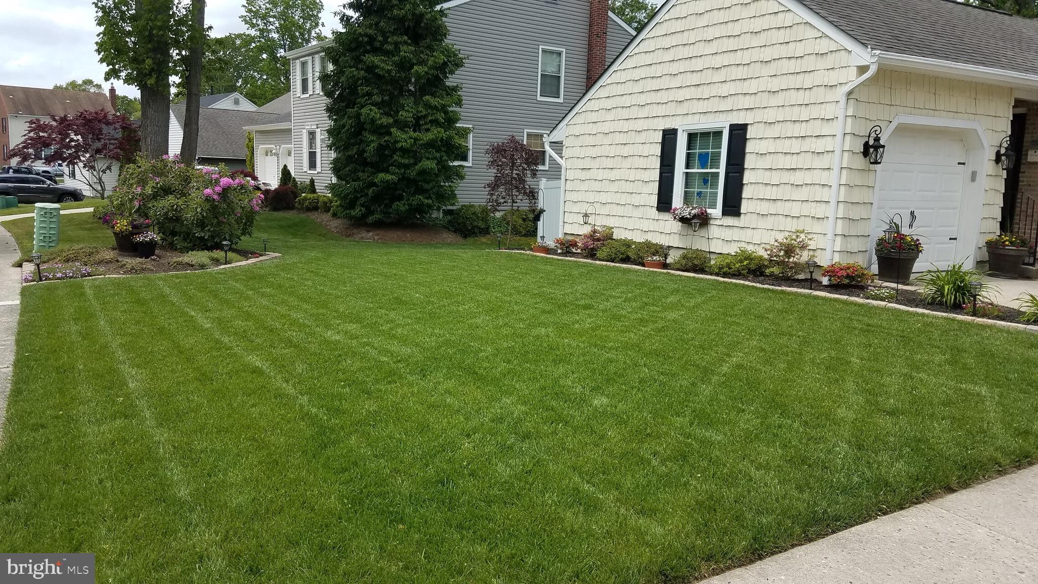 33 Pembrook Road Turnersville, NJ 08012 - Photo 43 of 43 a front view of house with yard and green space