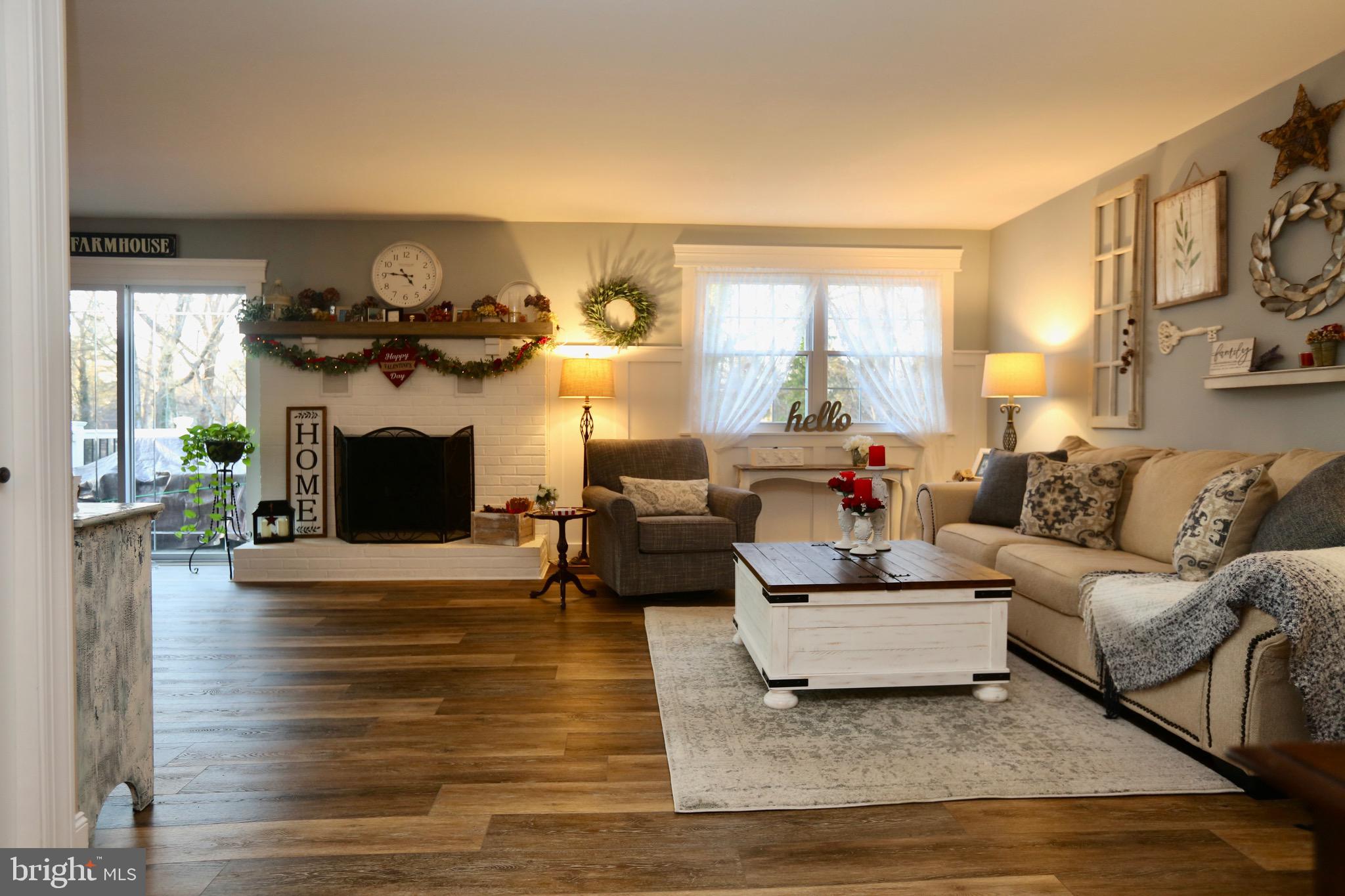 33 Pembrook Road Turnersville, NJ 08012 - Photo 5 of 43 a living room with furniture and a fireplace
