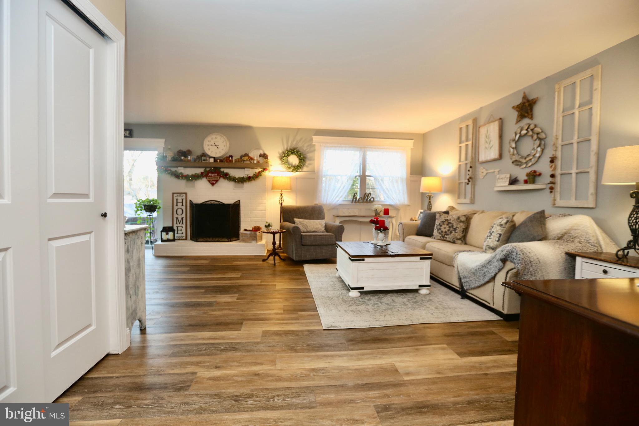 33 Pembrook Road Turnersville, NJ 08012 - Photo 6 of 43 a living room with furniture and a fireplace