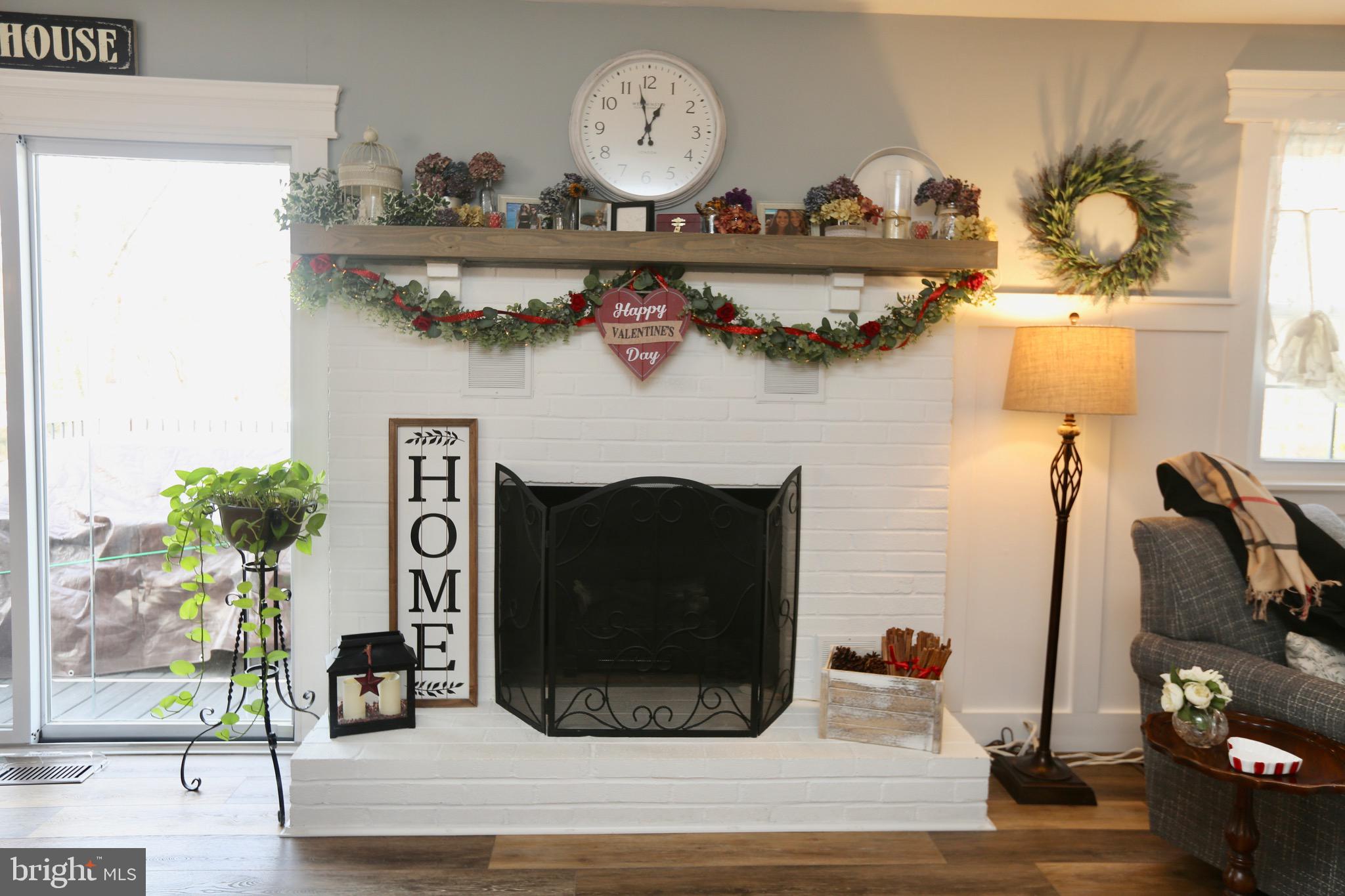 33 Pembrook Road Turnersville, NJ 08012 - Photo 8 of 43 a living room with furniture and a fireplace