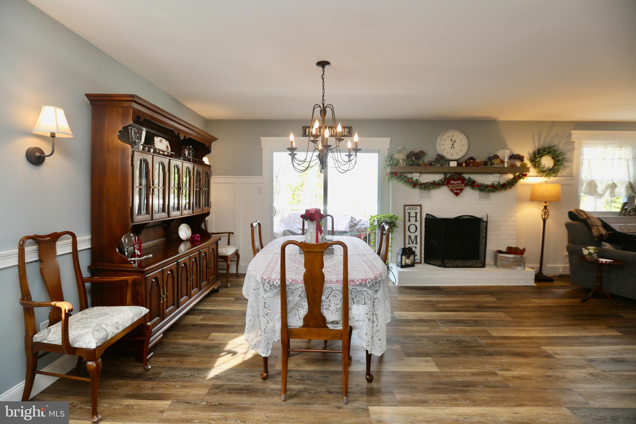 33 Pembrook Road Turnersville, NJ 08012 - Photo 9 of 43 a living room with furniture a fireplace and a flat screen tv