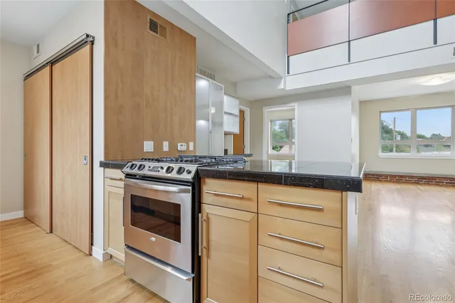 a view of storage and utility room with washer and dryer