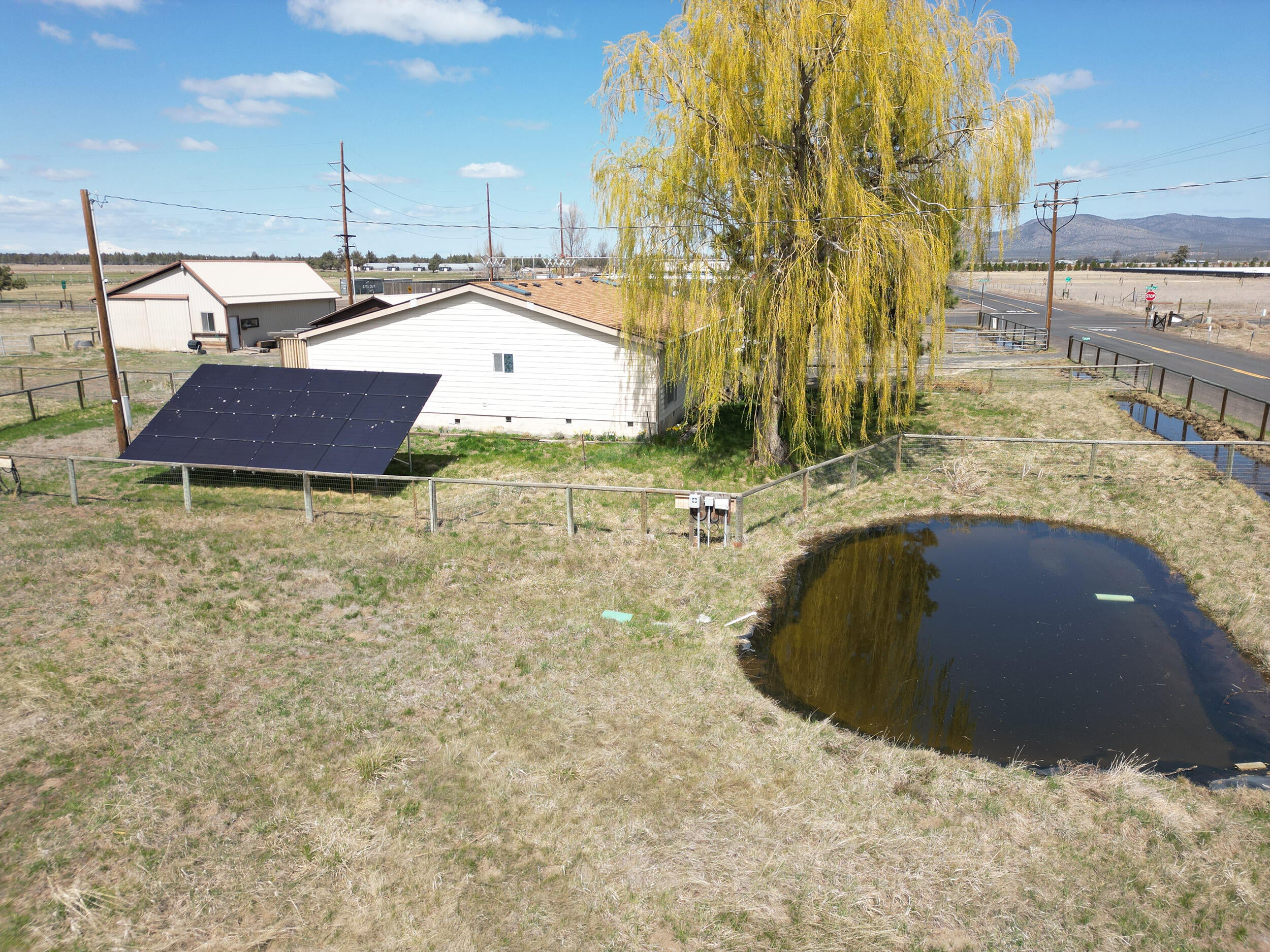 26395 Walker Road Bend, OR 97701 - Photo 28 of 36 Irrigation Pond & Solar Panels