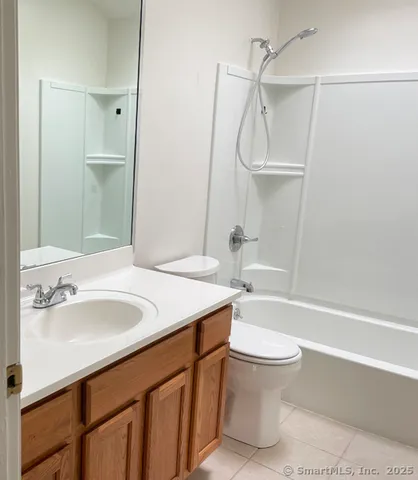 a bathroom with a sink a toilet and a bathtub