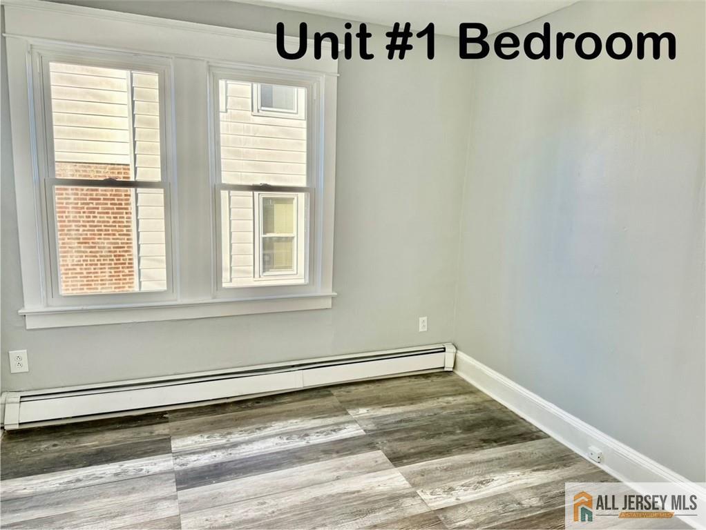 74 Andrew Street Hamilton, NJ 08610 - Photo 7 of 13 a view of a room with window and a ceiling fan