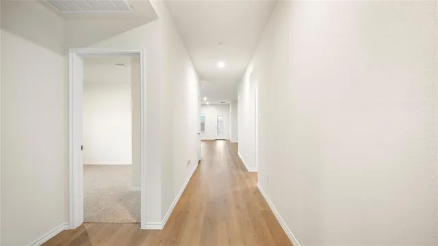 a kitchen with a stove and a sink
