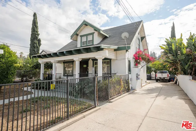 a front view of a house with balcony