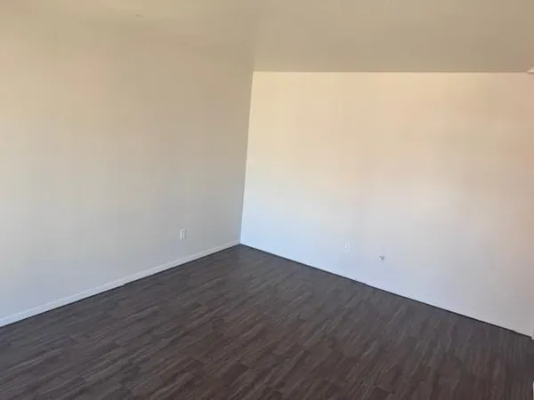 a kitchen with stainless steel appliances a refrigerator and a stove