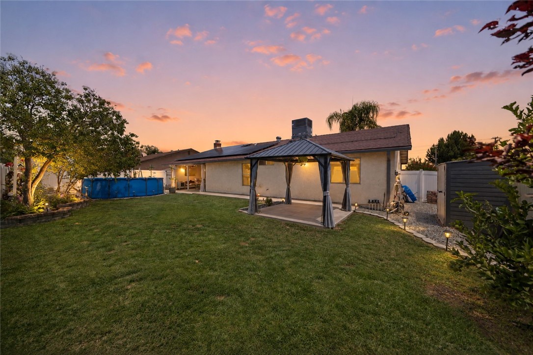 27879 Foxfire Street Menifee, CA 92586 - Photo 2 of 36 a view of a house with a backyard