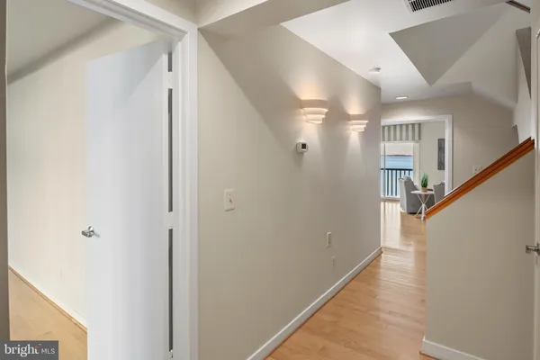 a spacious bathroom with a double vanity sink and a bathtub