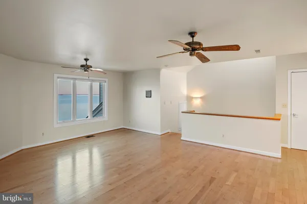 a view of a swimming pool with a lake view