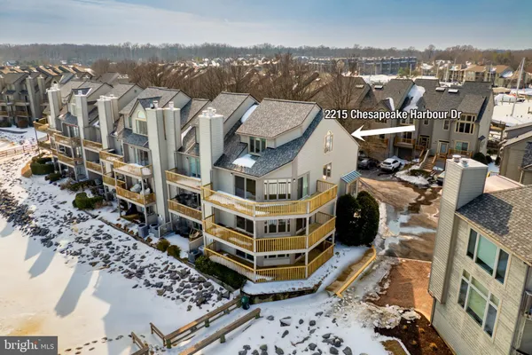 a sign that is on a brick wall