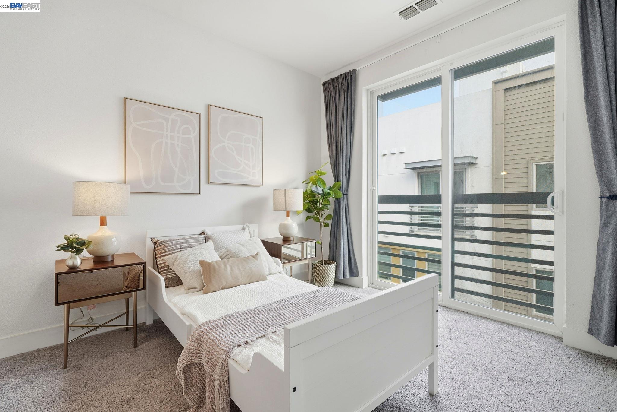 7906 Regional Common Dublin, CA 94568 - Photo 17 of 40 a bedroom with a bed and a window