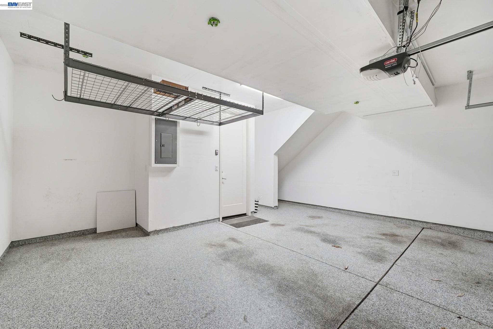 7906 Regional Common Dublin, CA 94568 - Photo 31 of 40 a view of a room with white walls and stairs