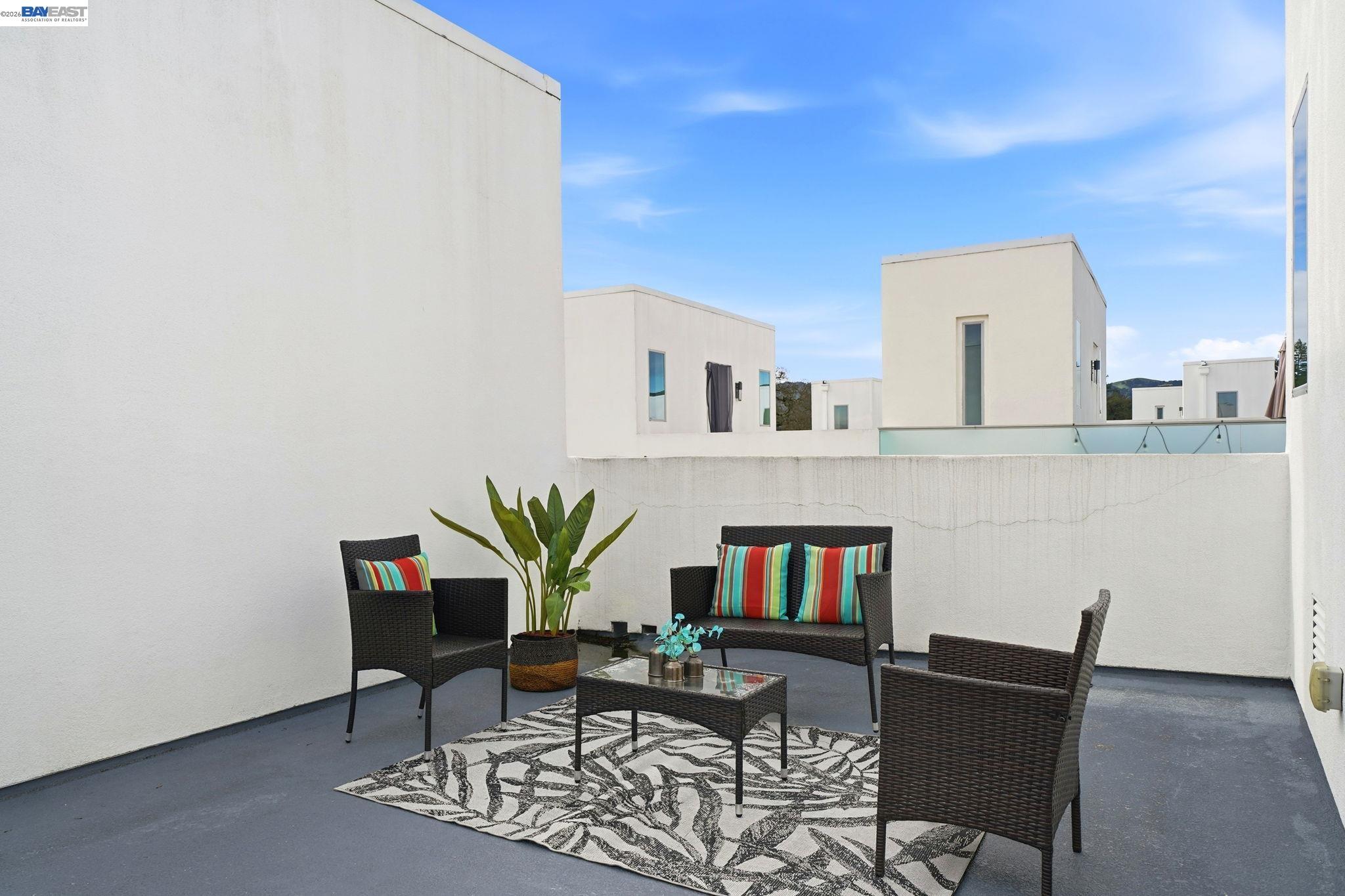 7906 Regional Common Dublin, CA 94568 - Photo 32 of 40 a living room with furniture and a book shelf