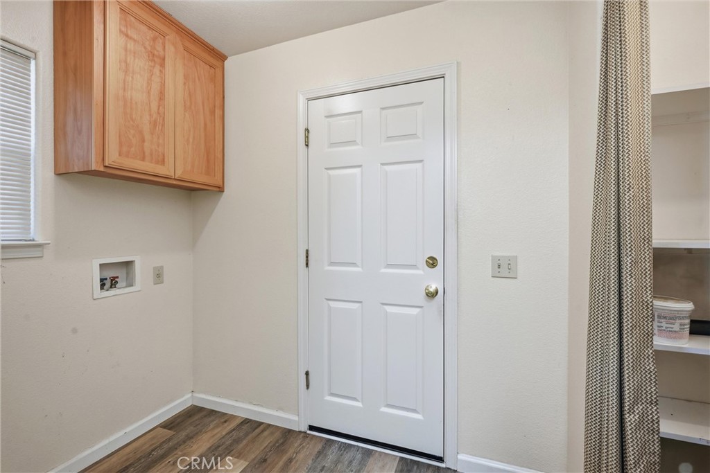 21229 Santa Clara Road Middletown, CA 95461 - Photo 14 of 40 Laundry room and Pantry connected to kitchen w/ door to garage