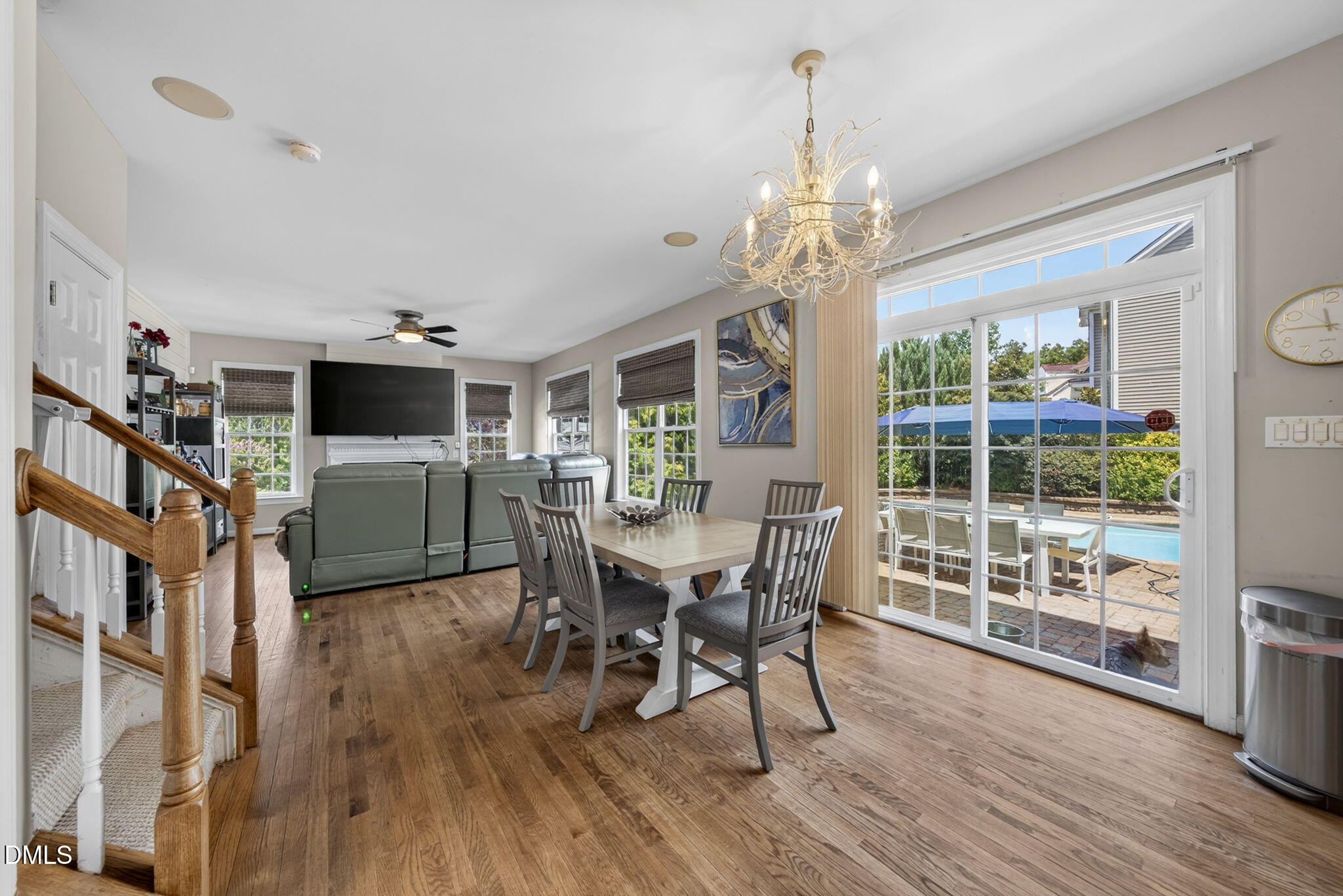 1258 Horsham Way Apex, NC 27502 - Photo 14 of 32 a view of a dining room with furniture window and wooden floor