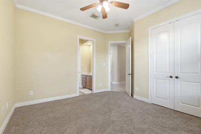 a en suite bathroom with a sink and a mirror