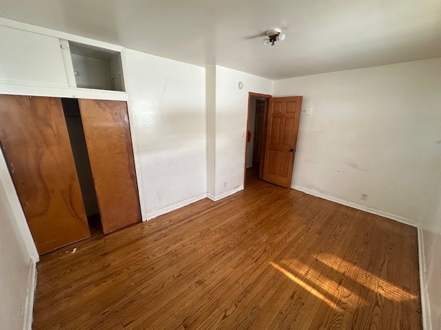519 North Forest Avenue Mount Prospect, IL 60056 - Photo 5 of 20 an empty room with wooden floor