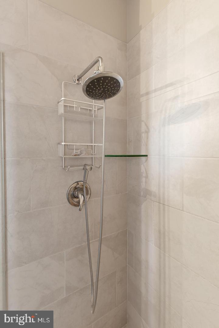 41 West Lemon Street, Unit 401 Lancaster, PA 17603 - Photo 15 of 22 a bathroom with a shower