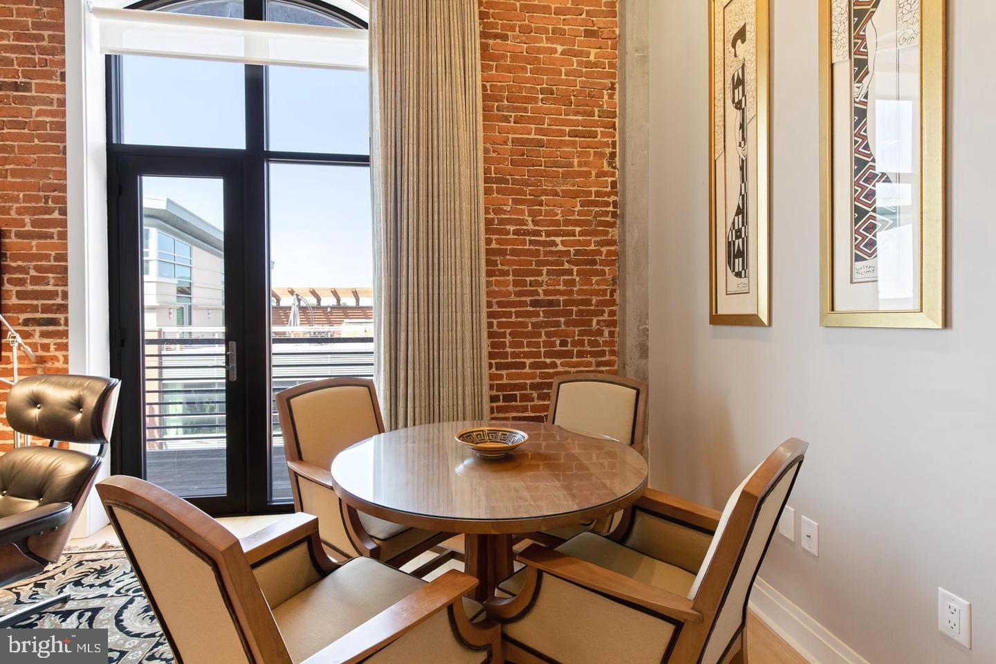 41 West Lemon Street, Unit 401 Lancaster, PA 17603 - Photo 6 of 22 a view of a dining room with furniture and window