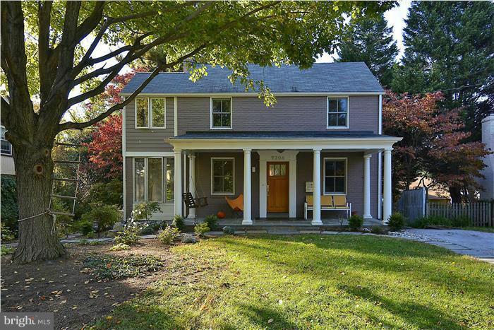 9206 Saybrook Avenue Silver Spring, MD 20901 - Photo 1 of 30 a front view of a house with a yard